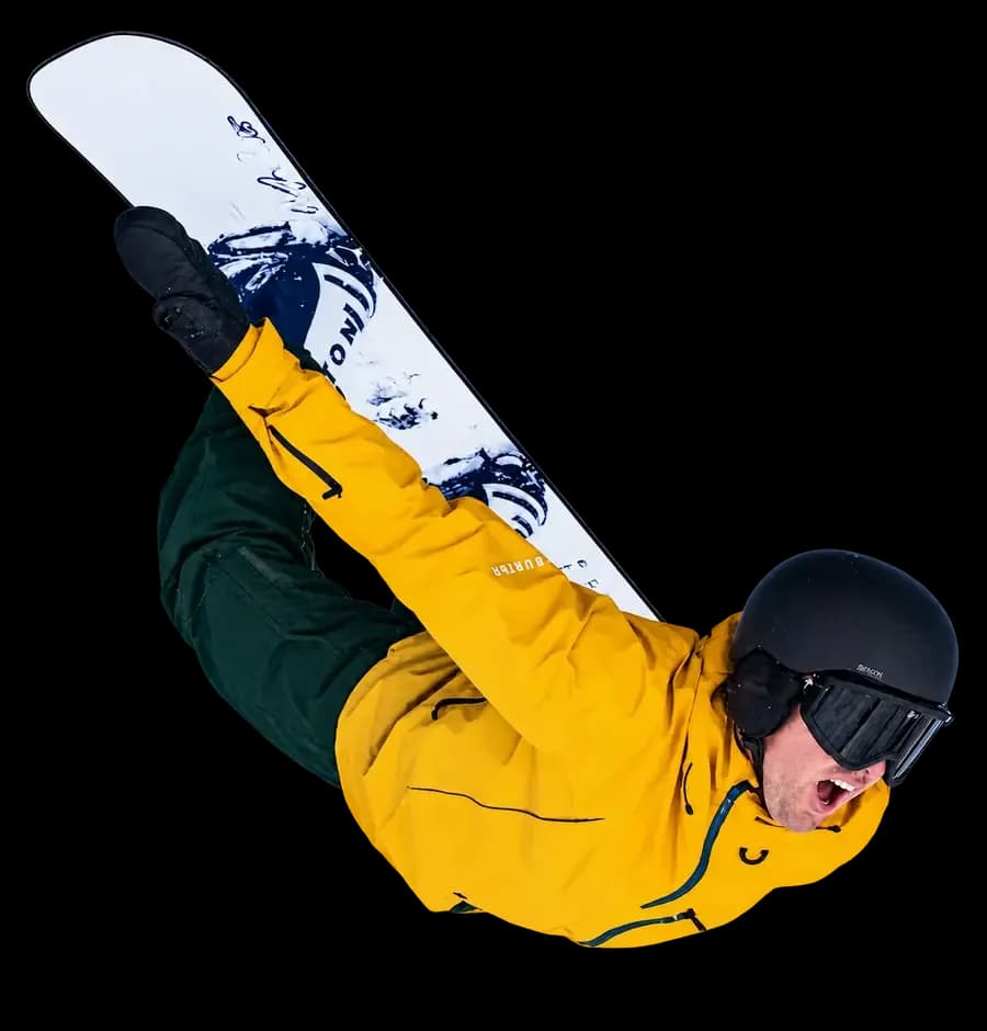 A snowboarder flying through the air at Thredbo